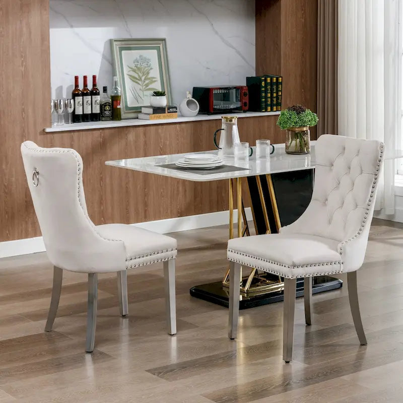 Chaise de salle à manger en velours avec garniture cloutée et pieds en acier inoxydable chromé