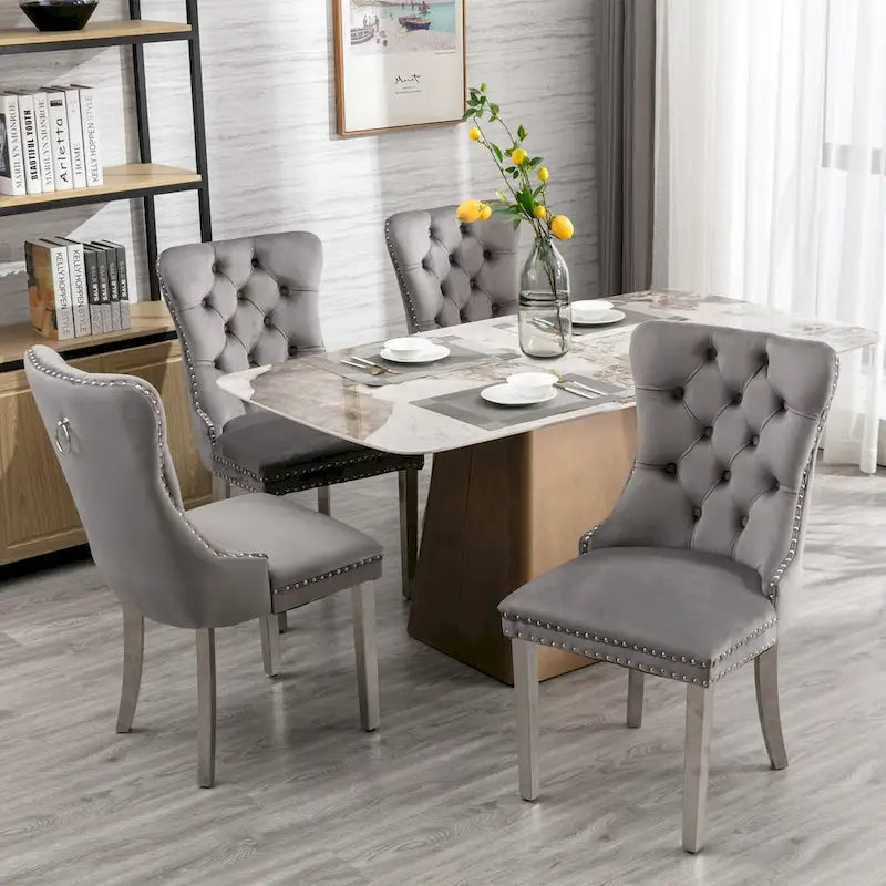 Chaise de salle à manger en velours avec garniture cloutée et pieds en acier inoxydable chromé