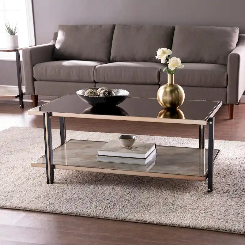 Table basse de cocktail effet miroir avec cadre couleur champagne et étagère inférieure
